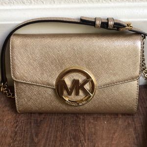 Gold Michael Kors crossbody purse